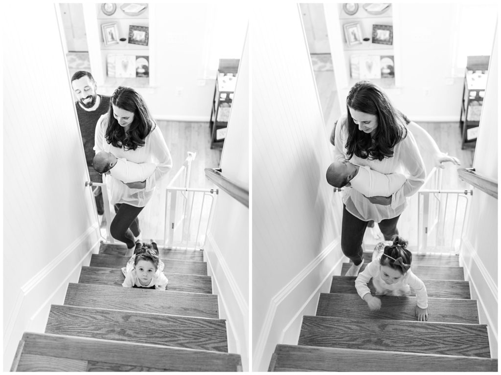 family going upstairs newborn lifestyle session 